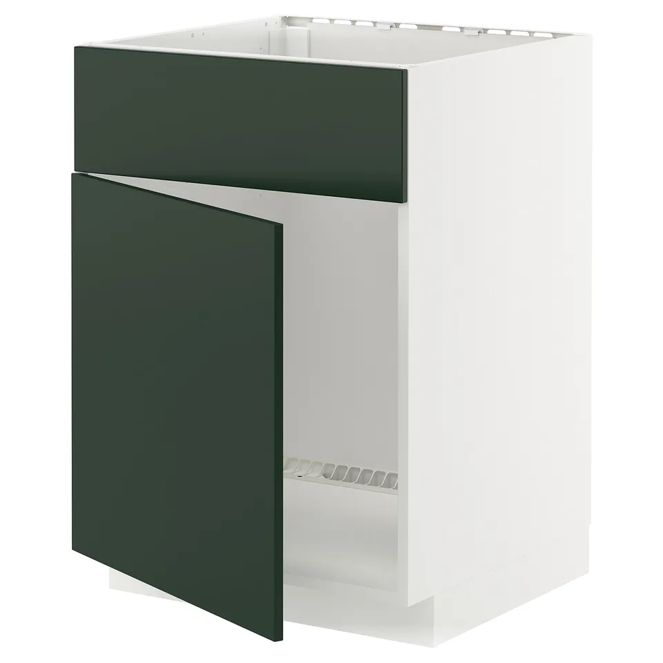 Flat-pack METOD kitchen unit in white with dark green door, rectangular shape.