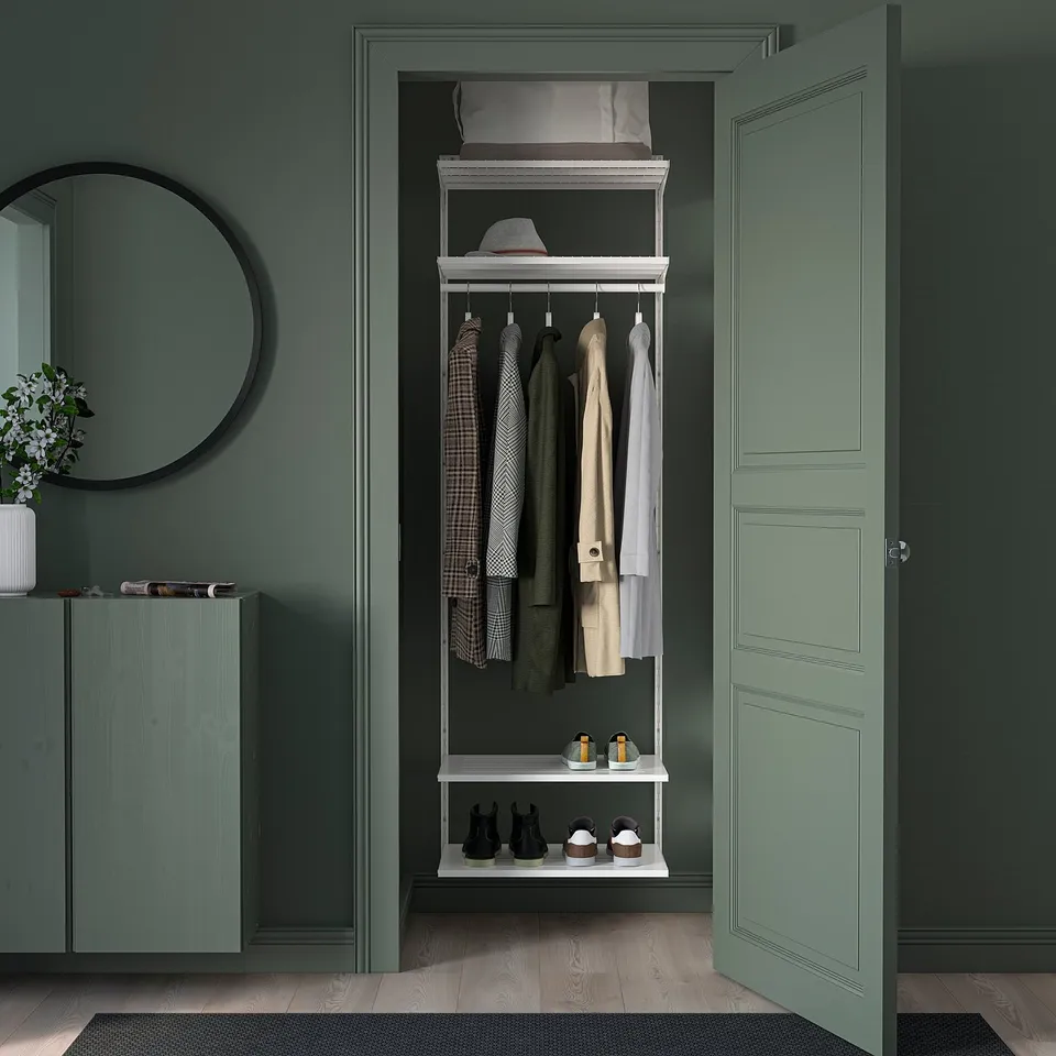 BOAXEL green wall storage unit with mirror and shoe rack.