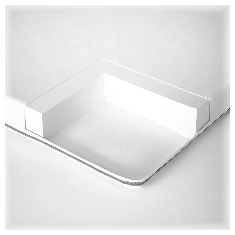 White tray with mesh edge; three-layered construction.