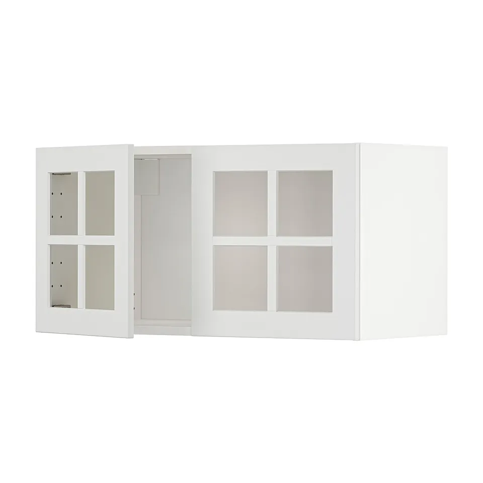 White METOD kitchen cabinet with frosted glass doors, modern design, sturdy frame.