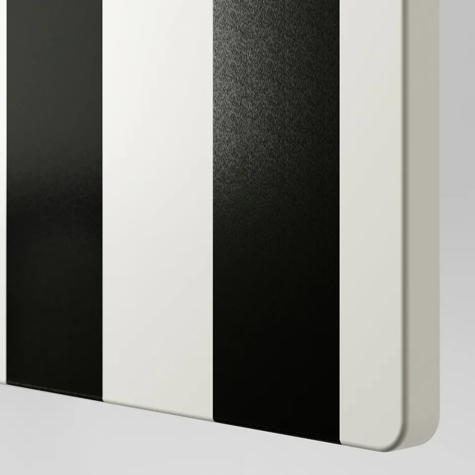 Modern wardrobe with sleek black and white stripes, smooth finish, and sturdy design.