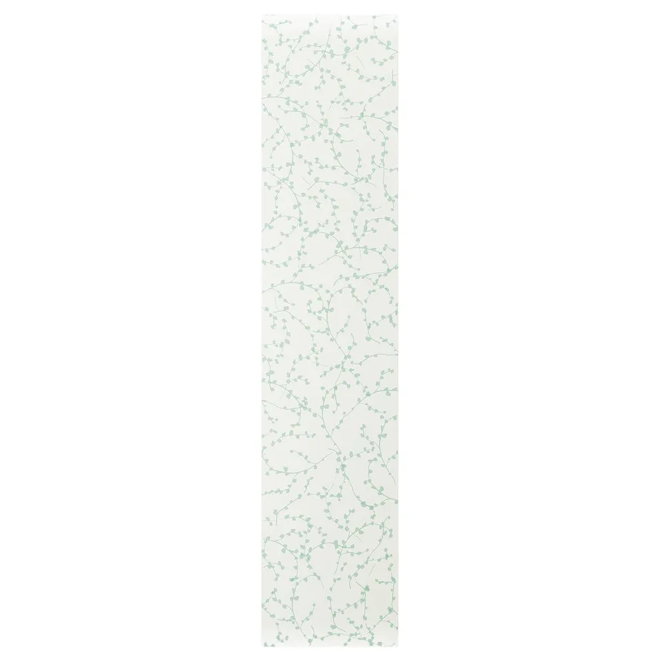 The LINNABERG door a white, floral design on a rectangular shape, combining style and functionality for storage solutions.