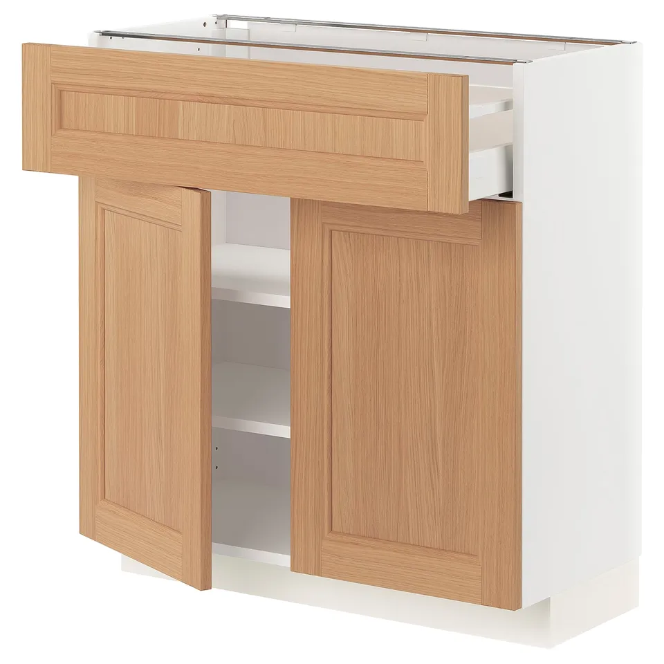 METOD kitchen unit in white & oak. Adjustable shelves, sturdy frame, and oak doors with three panels.