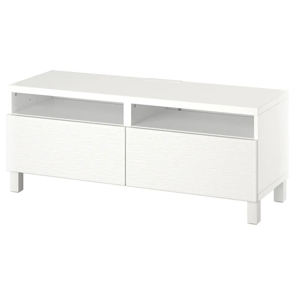BESTÅ white tv stand with drawers and open compartments.