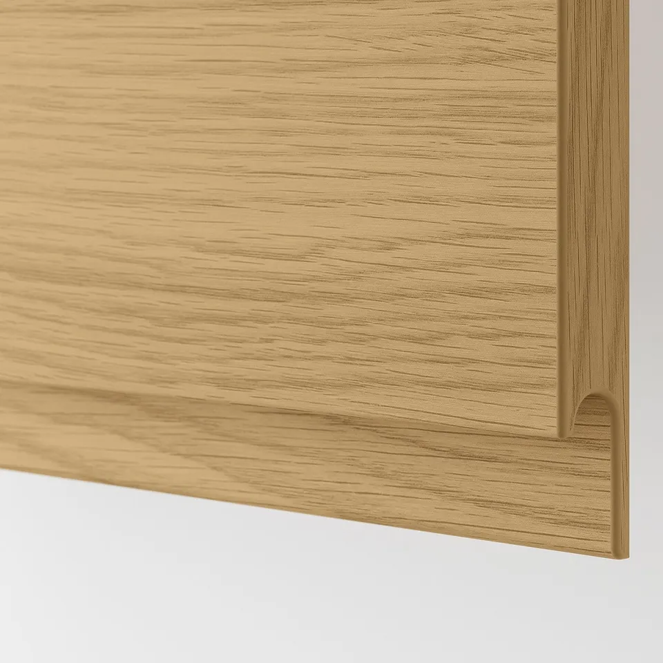 Close-up of oak-finished wooden cabinet with sleek, minimalist design featuring integrated handles.