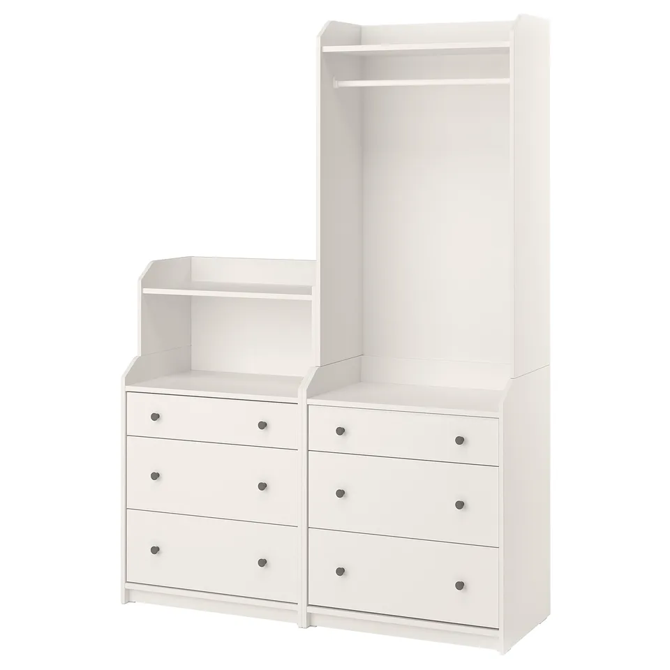 A white HAUGA furniture set including a wardrobe and chests, featuring drawers and shelves made of particleboard and fiberboard for storage.