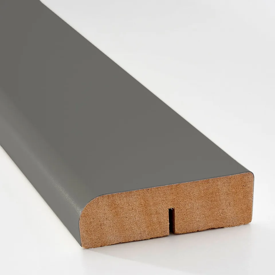 Close-up of a sleek, grey modern trim piece, showcasing its smooth finish and precise cut, indicating high quality.