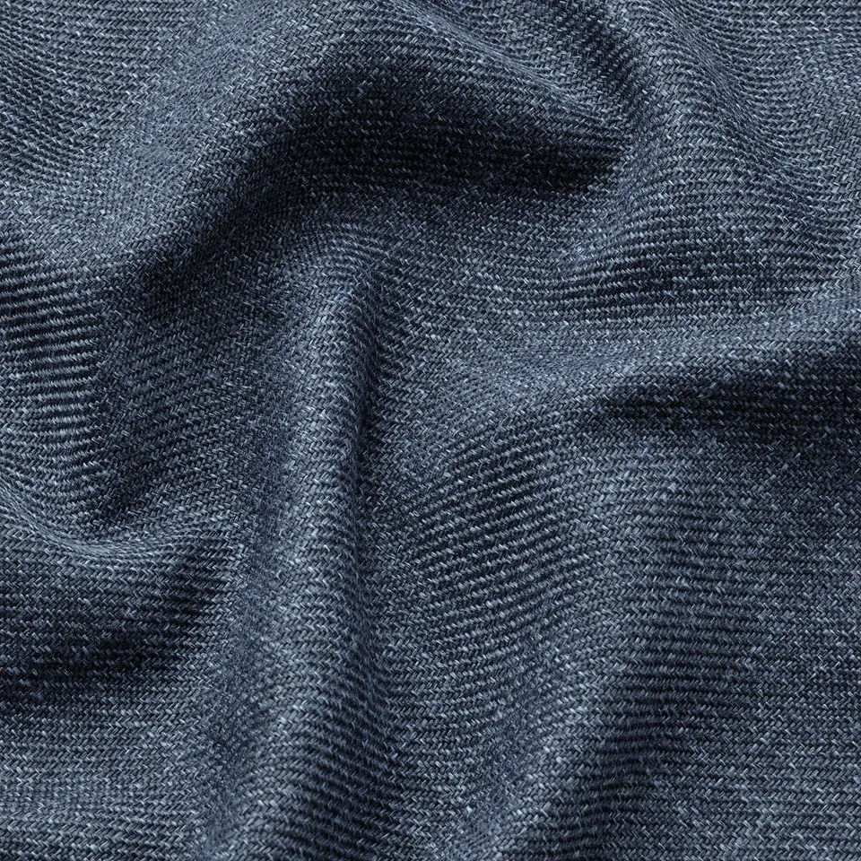 Grey fabric with herringbone weave, smooth texture, shows quality craftsmanship.