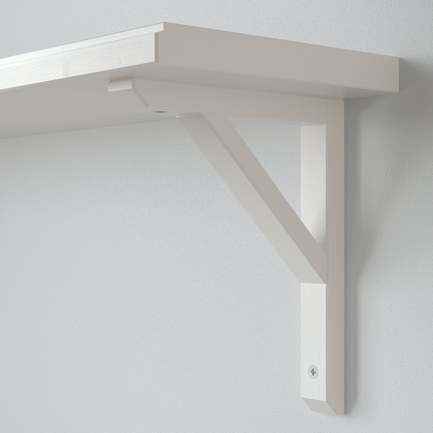 Sleek white wall shelf with sturdy wooden support.