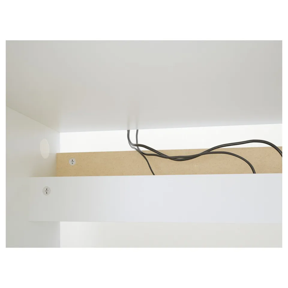 A sleek, modern desk with cable management under a wooden shelf, combining functionality and aesthetics in a minimalist design.