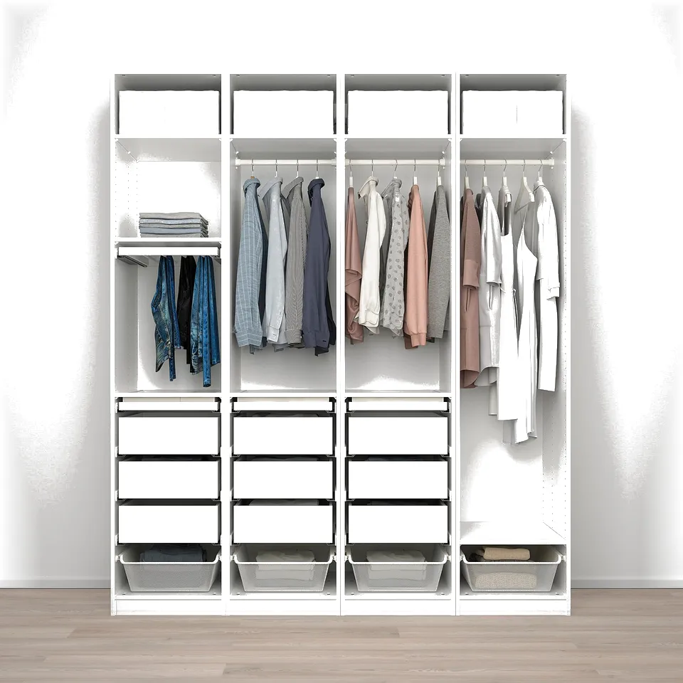A white PAX wardrobe with clothes and drawers, featuring hanging space, shelves, and storage baskets.