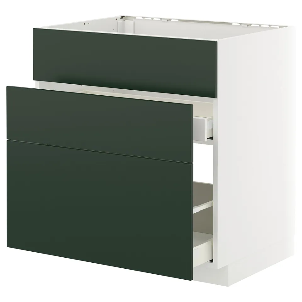 Modern green kitchen drawer unit, white cabinet, simple design.