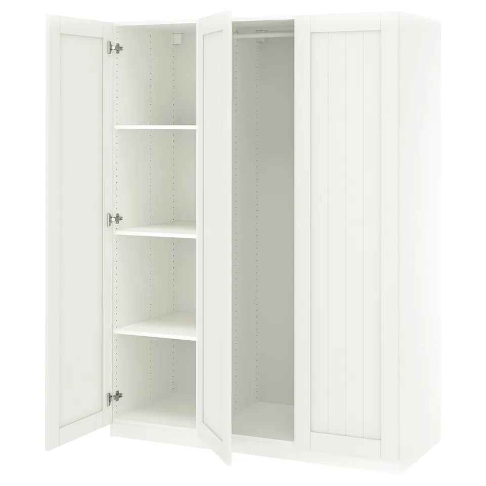 A white ikea PAX wardrobe with one door open, revealing adjustable shelves inside.