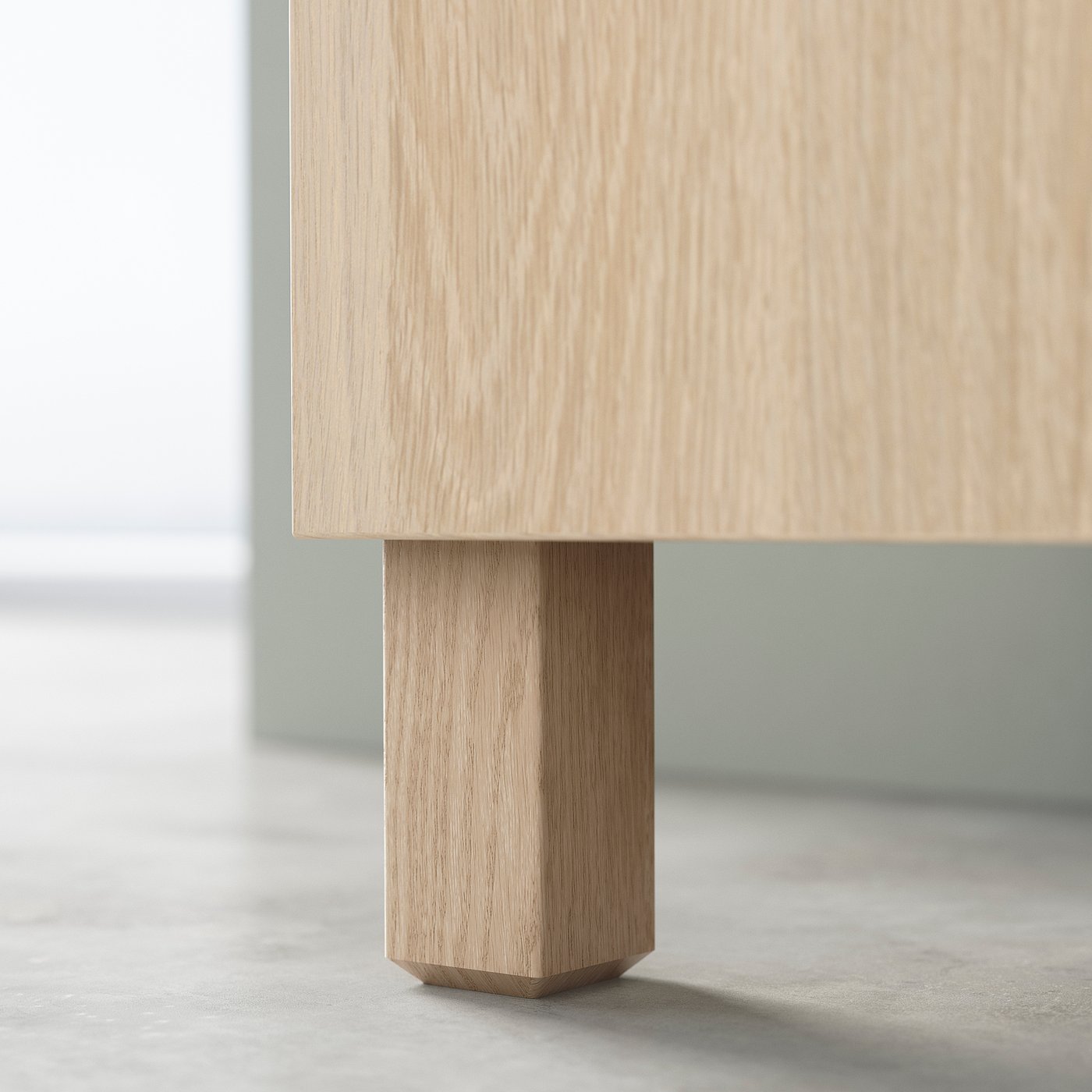 Wooden furniture leg, light-colored, square base, minimalist design.