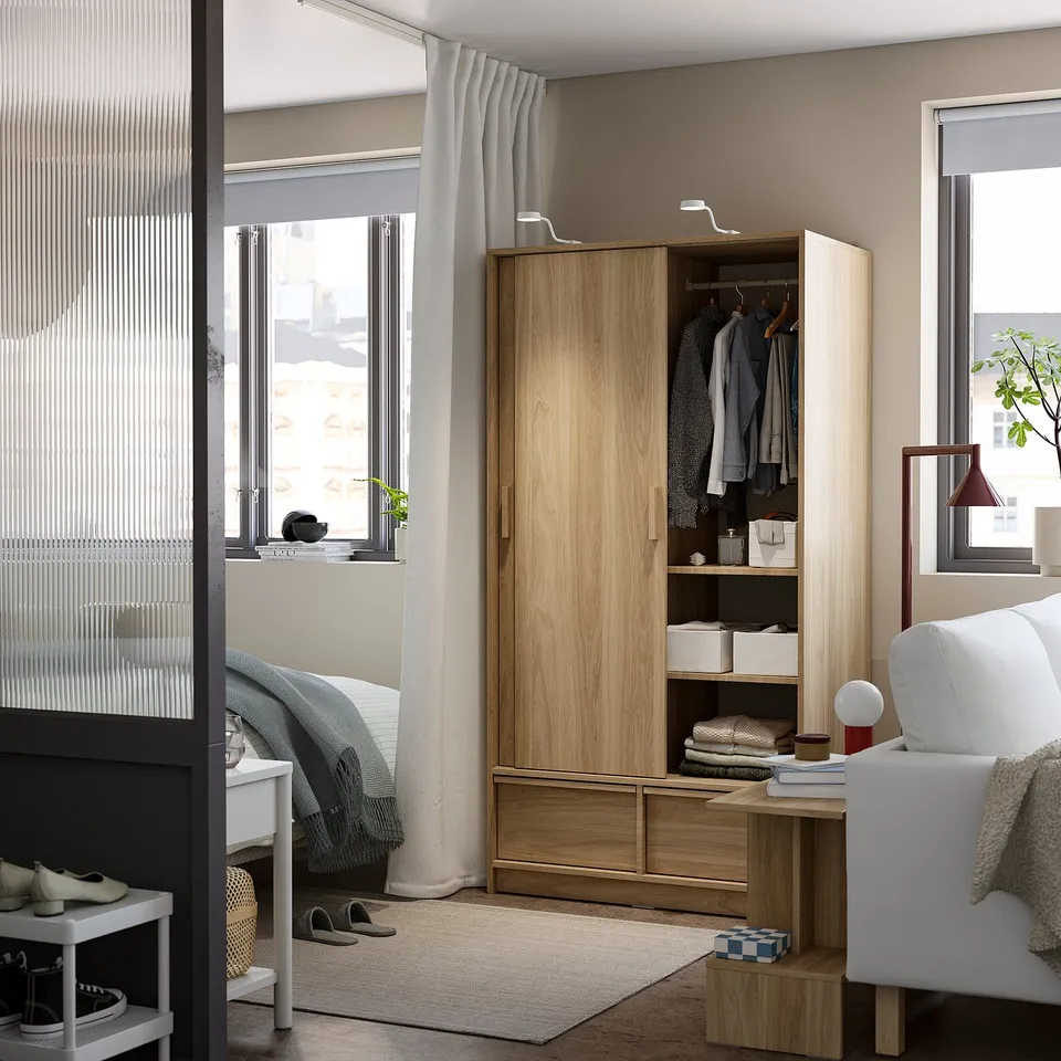 ANKARUDDEN Wardrobe with sliding doors, oak effect, 98x60x190 cm