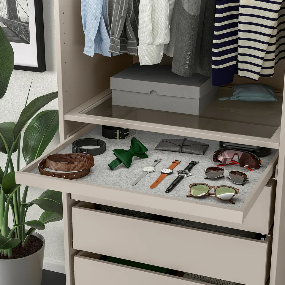 Open wardrobe with accessories tray: belts, watches, sunglasses, organiser inside.