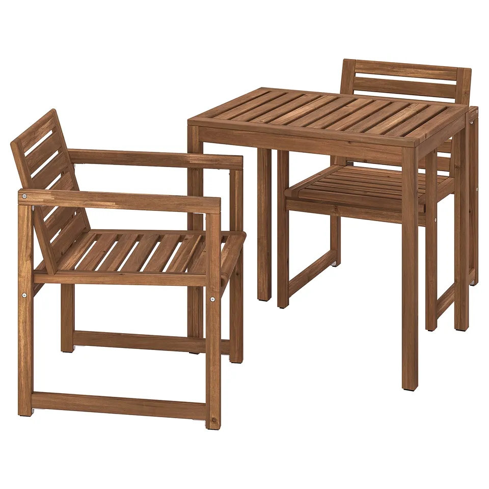 The NÄMMARÖ outdoor furniture set in brown, made of acacia wood, consisting of a square table and two armchairs.