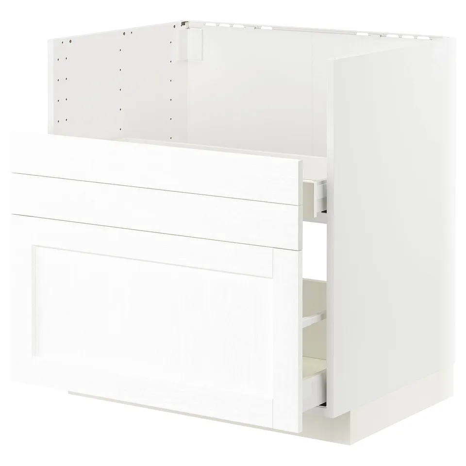 White kitchen cabinet; two doors, one open drawer; smooth finish.