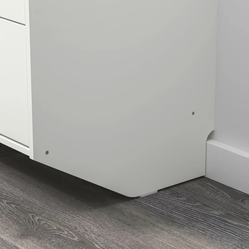 Modern white RACKNÄS chest, wall-mounted; sleek design, sturdy build, clean finish.