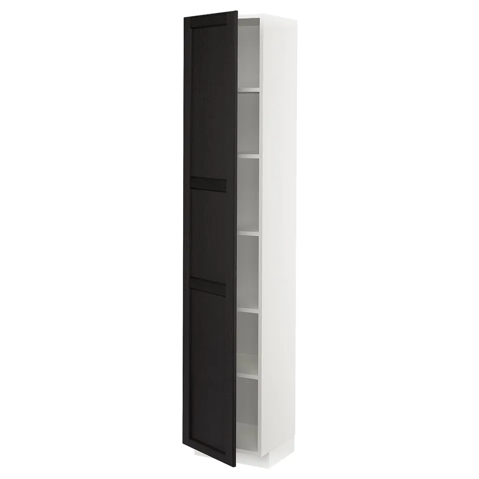 A white METOD kitchen cabinet with black stained wooden doors and bevelled edges. The cabinet has adjustable shelves and a sleek, modern design.