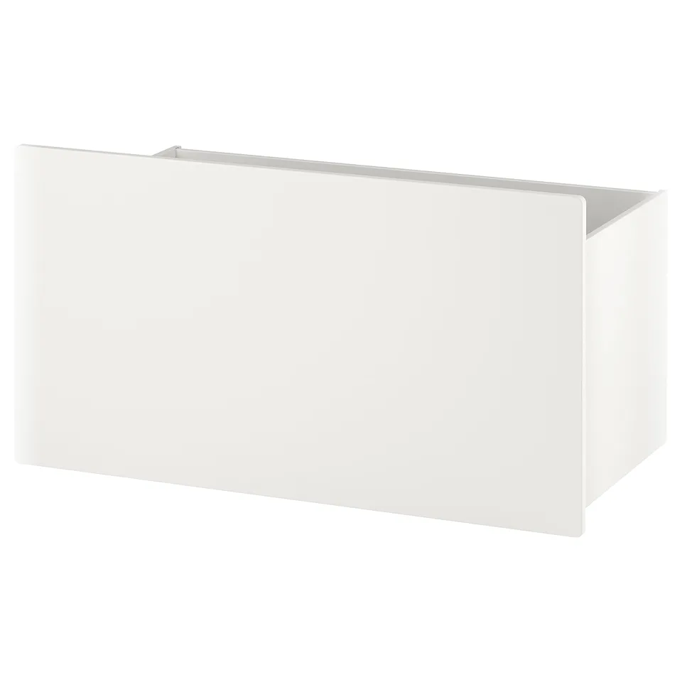 A white rectangular storage box on wheels, part of the SMÅSTAD collection. Its modern design clean lines and practical castors for easy movement.