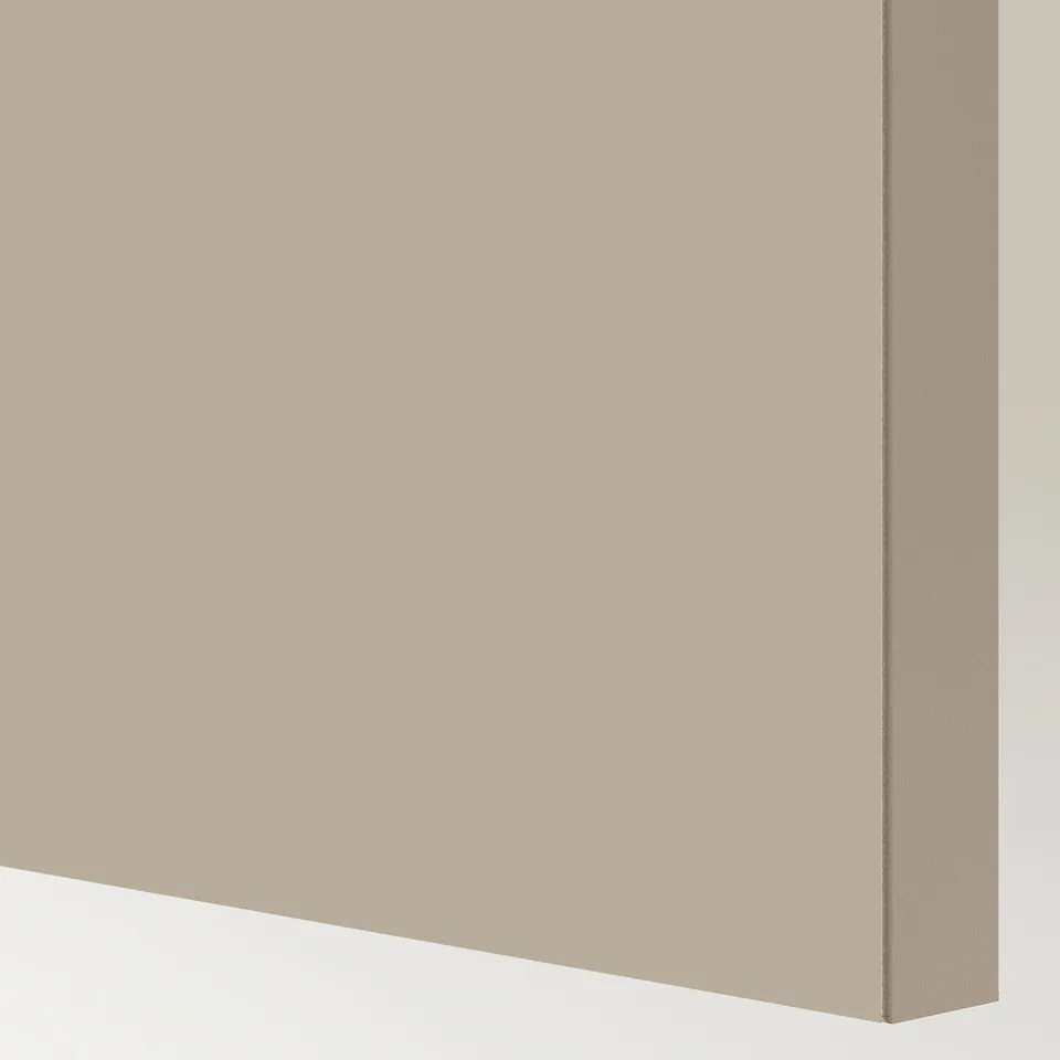 Close-up of sleek, modern beige sliding door, smooth finish & clean edges.