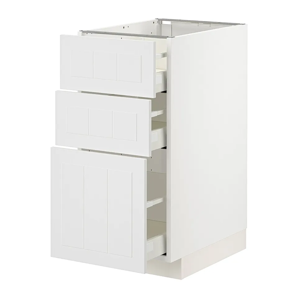 A white ikea METOD kitchen cabinet with three drawers and a door. It has a clean, modern design made of engineered wood.