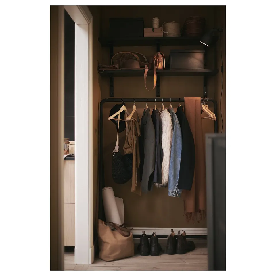 Black TURBO storage unit with shelves and castors.