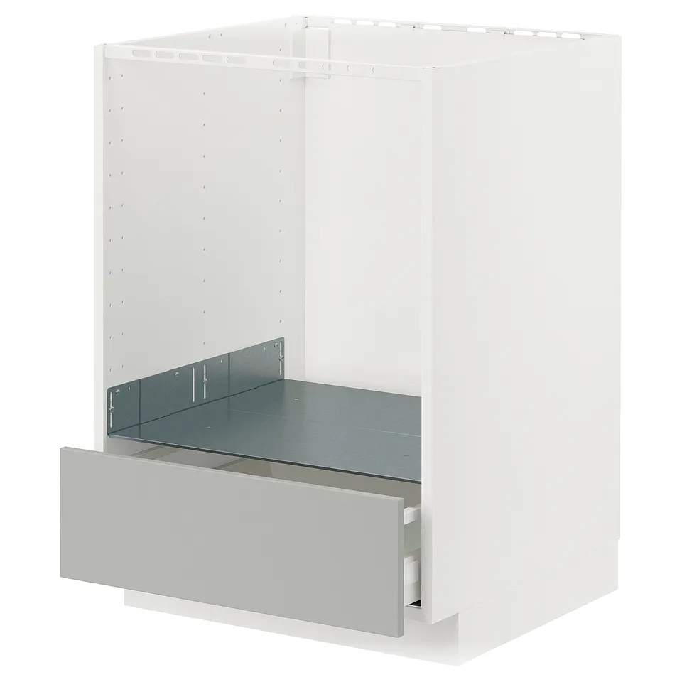 A white METOD kitchen cabinet with a light grey drawer, featuring a modern clean look.