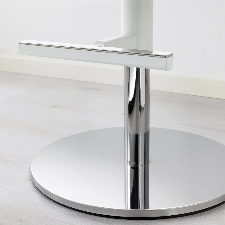 Modern chair base with polished metal finish and round steady base.