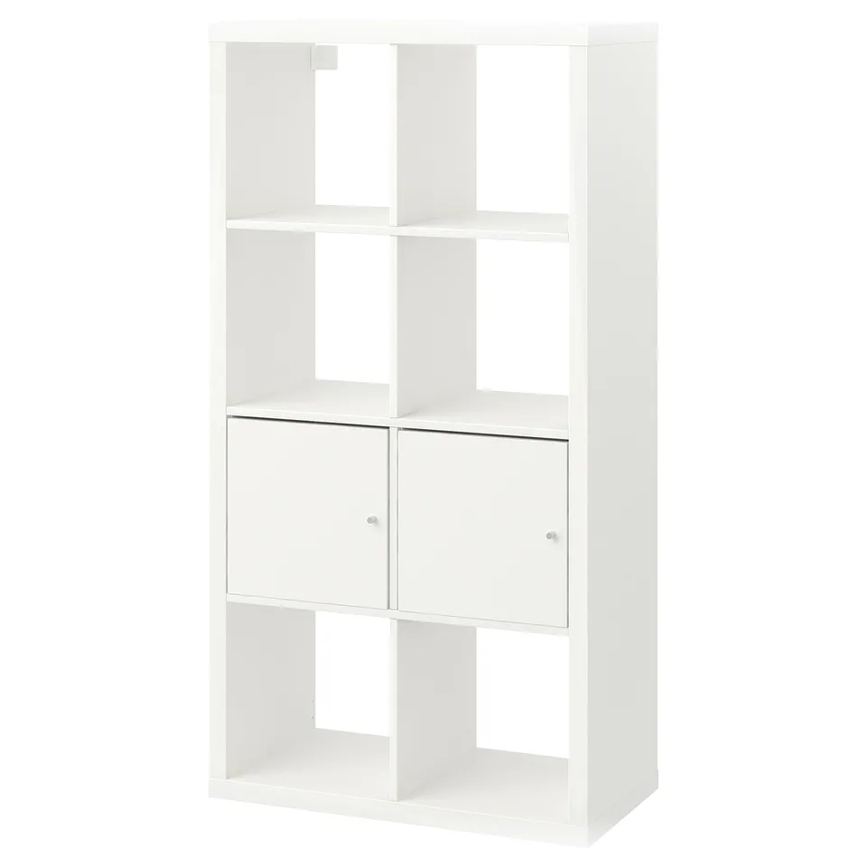 An ikea KALLAX white shelving unit with two closed cabinets and open sections.