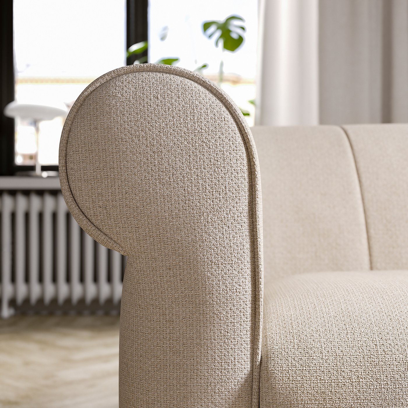 Modern armchair with rounded beige fabric design, soft cushions, and wooden legs.