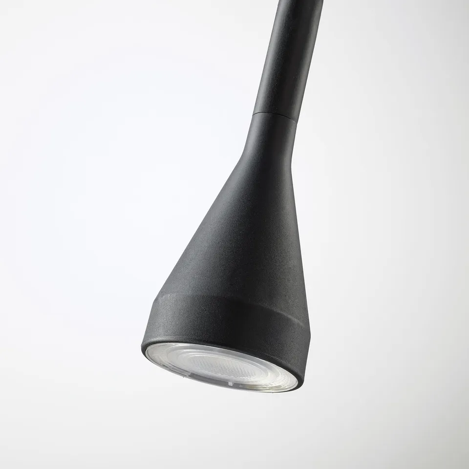 Modern black pendant lamp with adjustable neck, emitting soft, focused light.