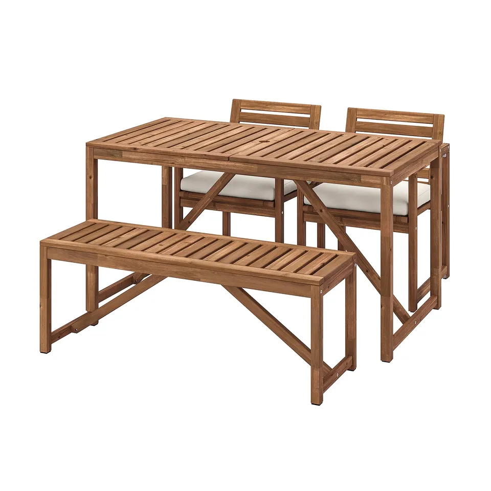 Brown outdoor NÄMMARÖ dining set with table, bench, and two chairs.