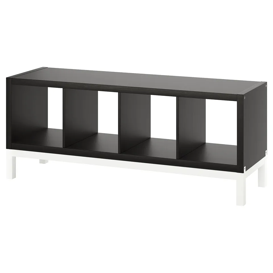 Black KALLAX shelving unit with four compartments and white legs.