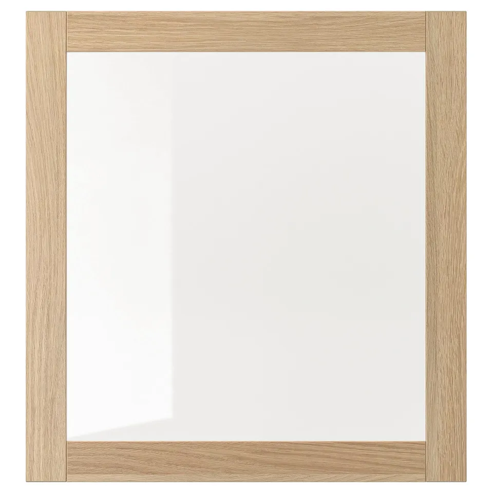 A SINDVIK frame with an oak effect in white. Its a square shape with clear glass in front.