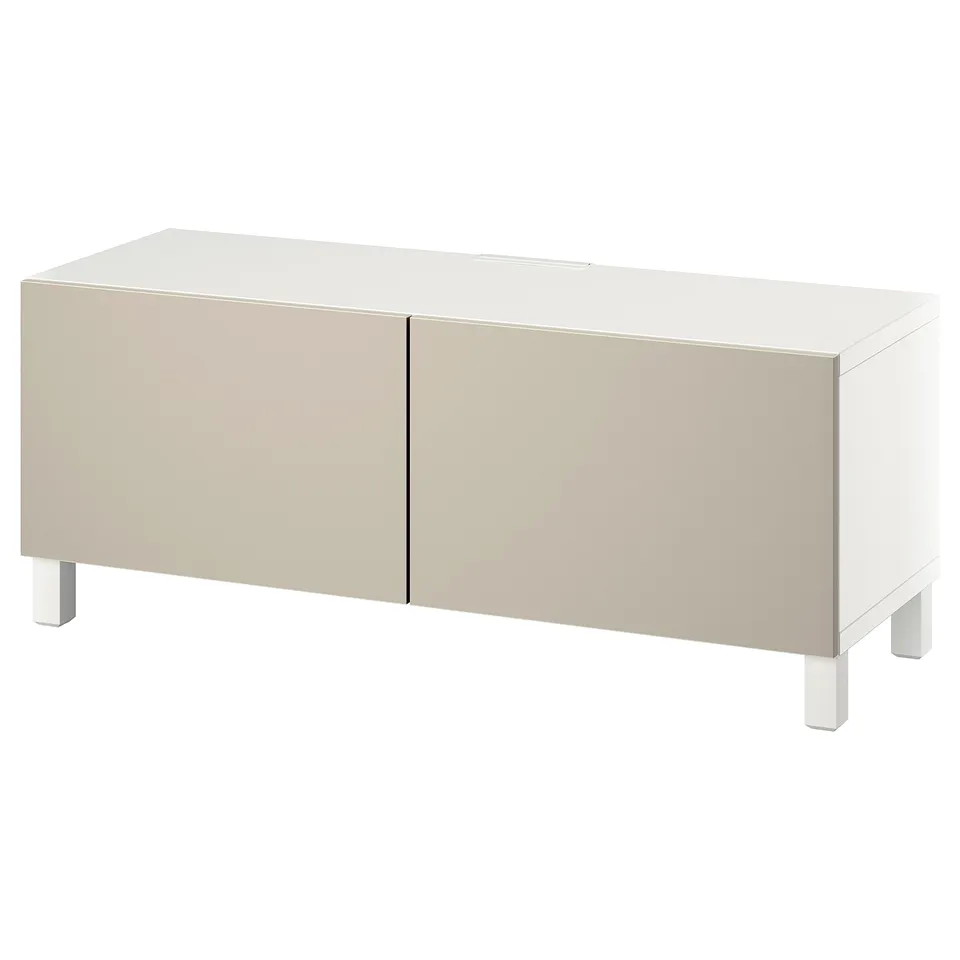 A white and beige BESTÅ tv bench with two doors and adjustable shelves. It has a sleek, modern design and is supported by four square legs.