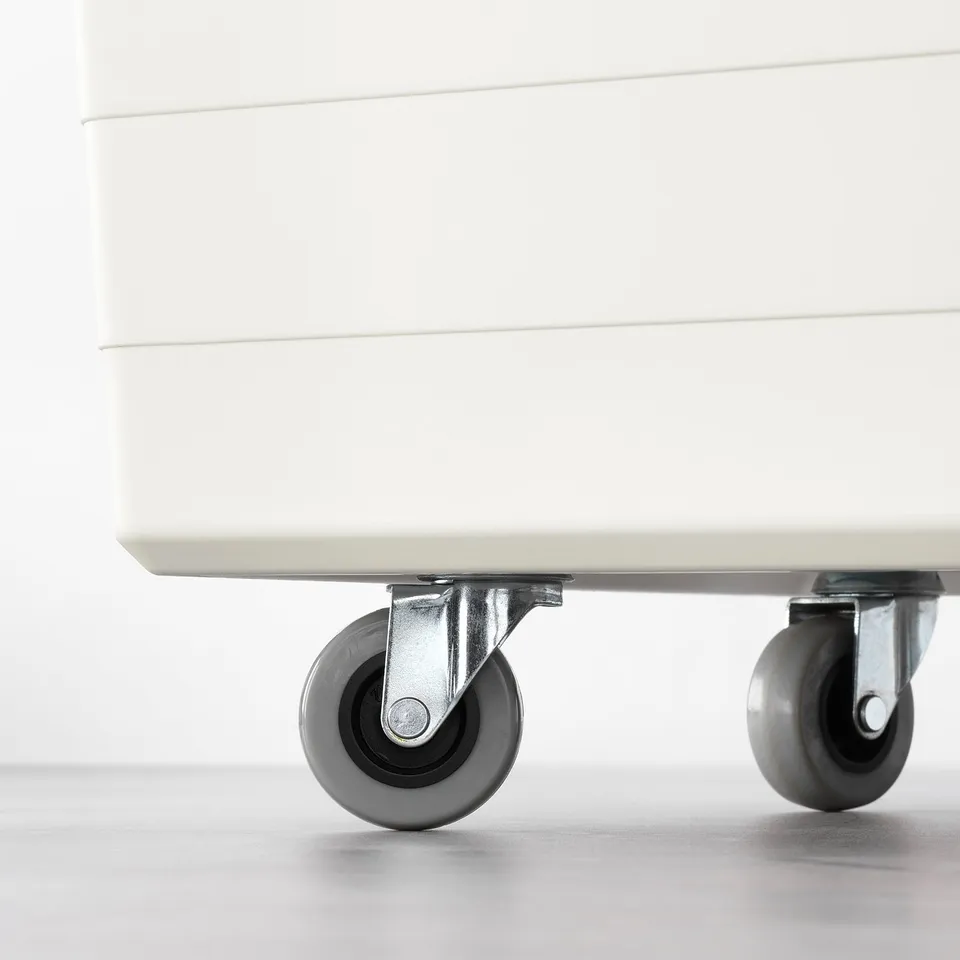 White plastic storage box with black wheels, featuring built-in locking mechanism and air circulation design.
