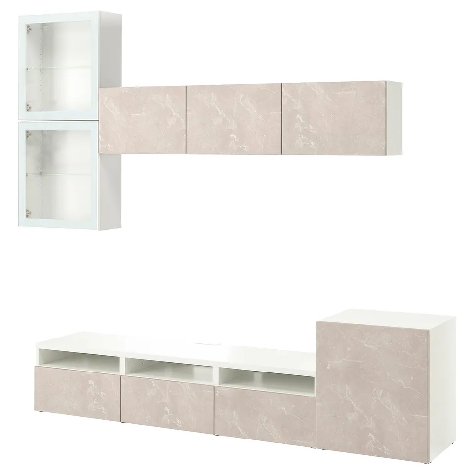 A white and light marble-patterned BESTÅ tv storage combination. It includes wall-mounted cabinets and a tv bench with adjustable shelves and drawers.