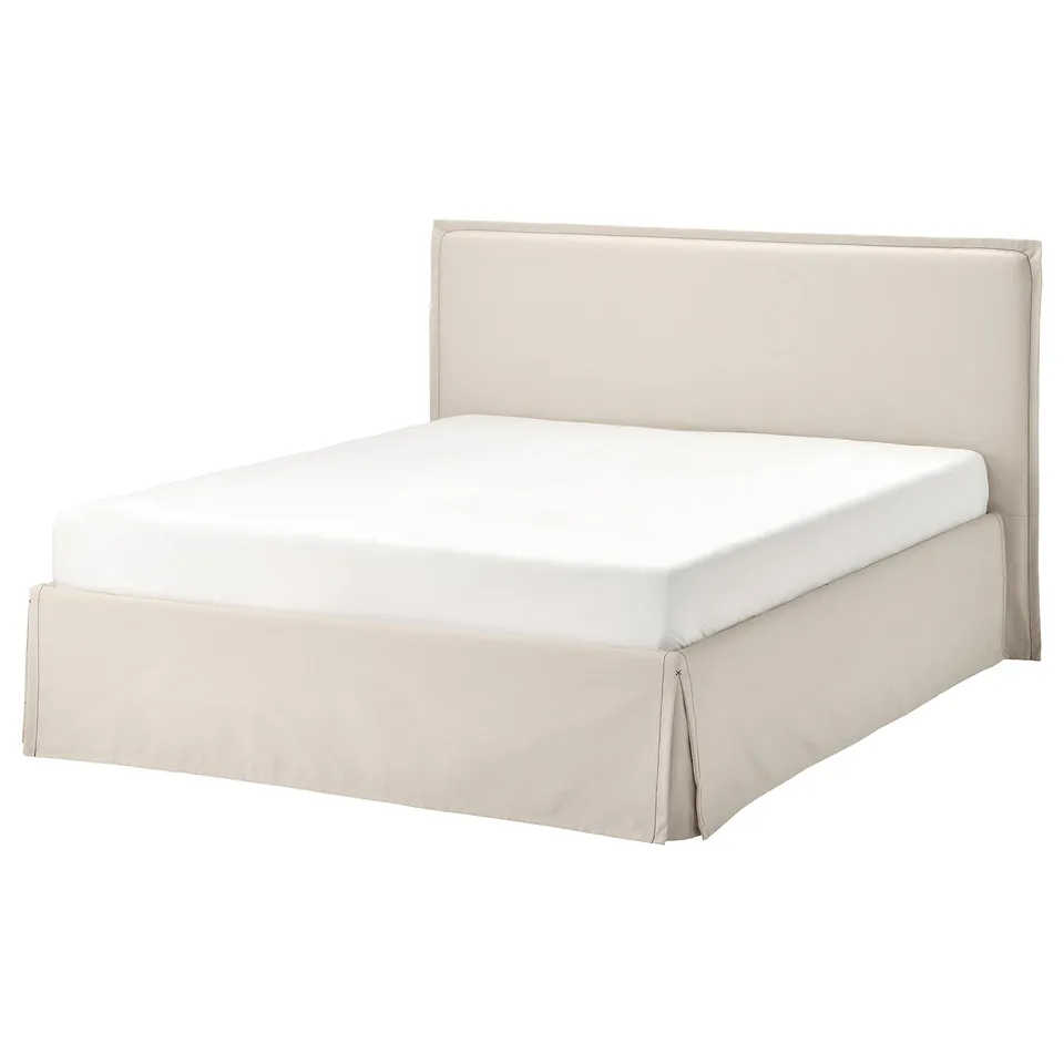 Beige TÄRNKULLEN bed frame with padded headboard.