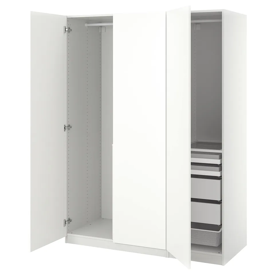 A white ikea PAX wardrobe with adjustable shelving and drawers, including a mesh basket.