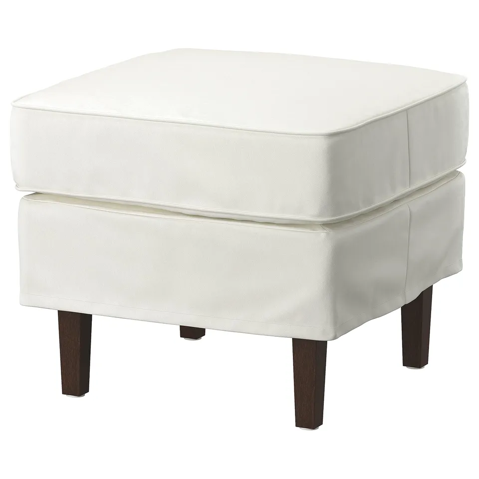 White, square ottoman with upholstered cushion, dark legs.