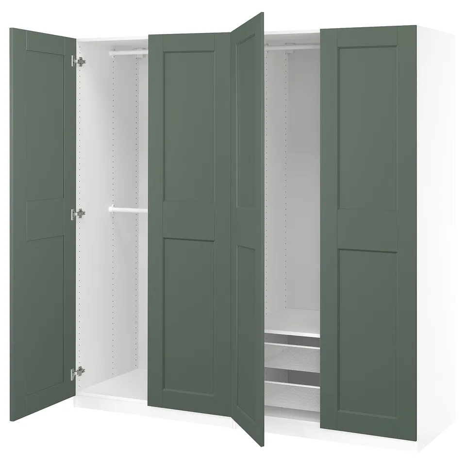 PAX wardrobe in green, open doors revealing shelves and rail space. Modern design, sturdy materials.