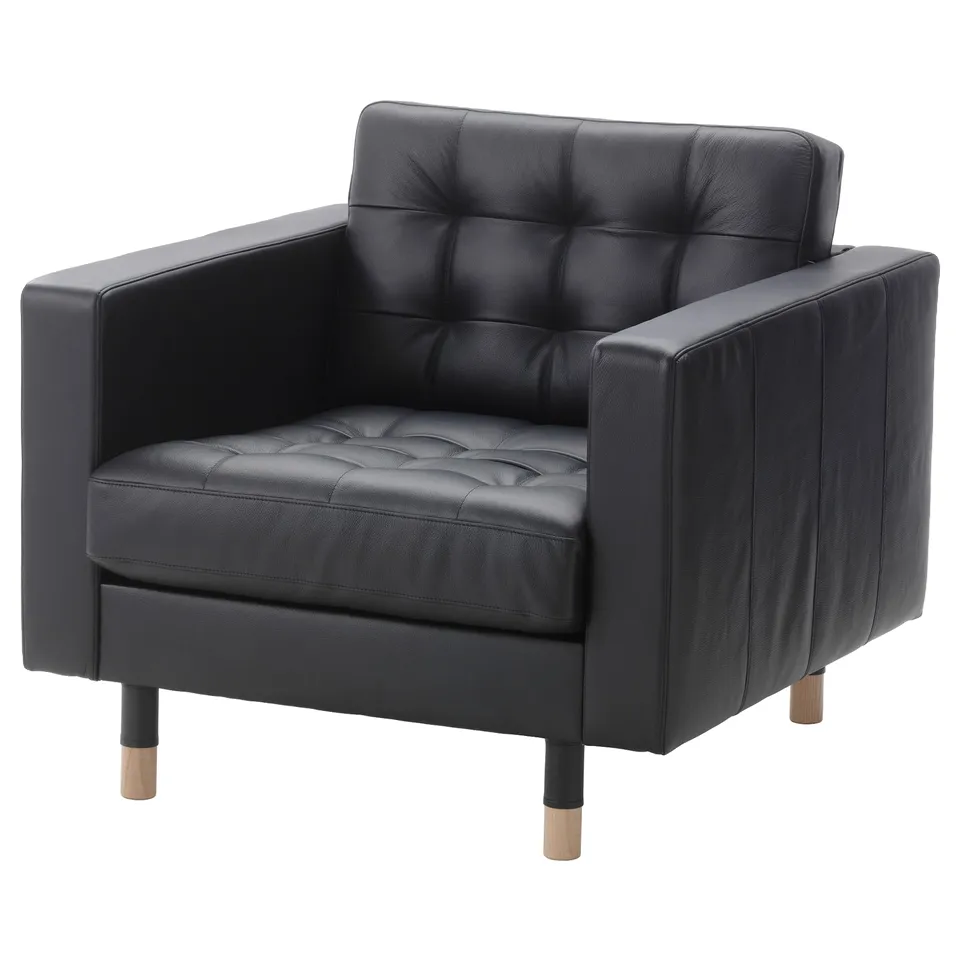 Black leather armchair, square cushions, wooden legs, sleek modern design.