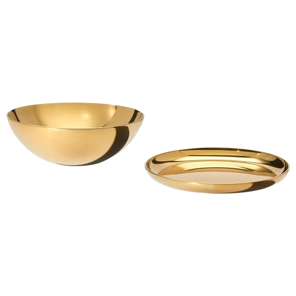 Two gold-colored, stainless steel items: a round bowl and a shallow dish. Sleek and modern, perfect for decor or storage.