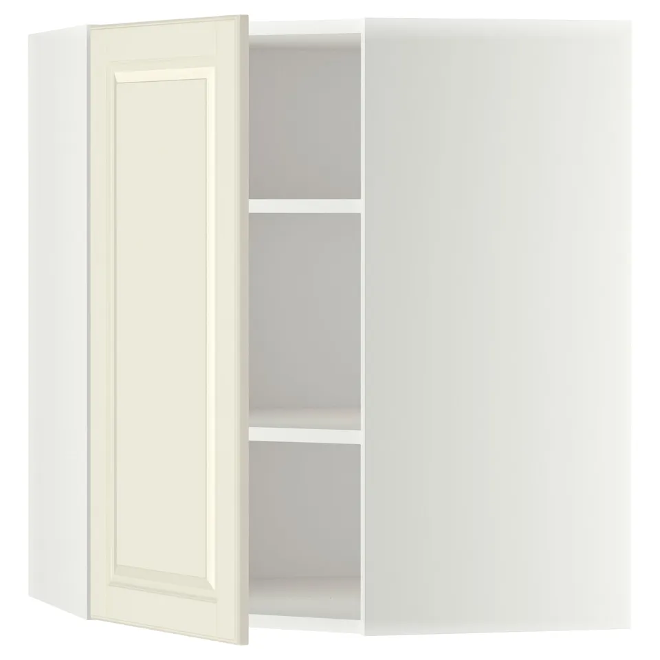 A white METOD kitchen cabinet with one door open, revealing an adjustable shelf inside.