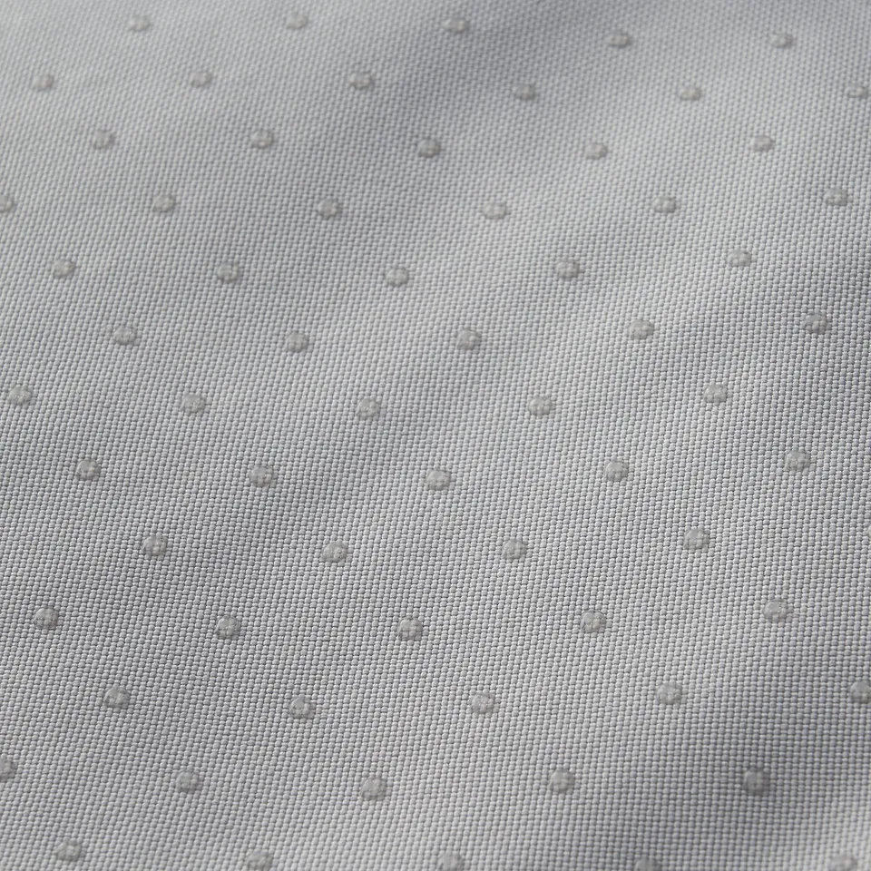 Soft pet bed with weave pattern and small dimples for comfort.