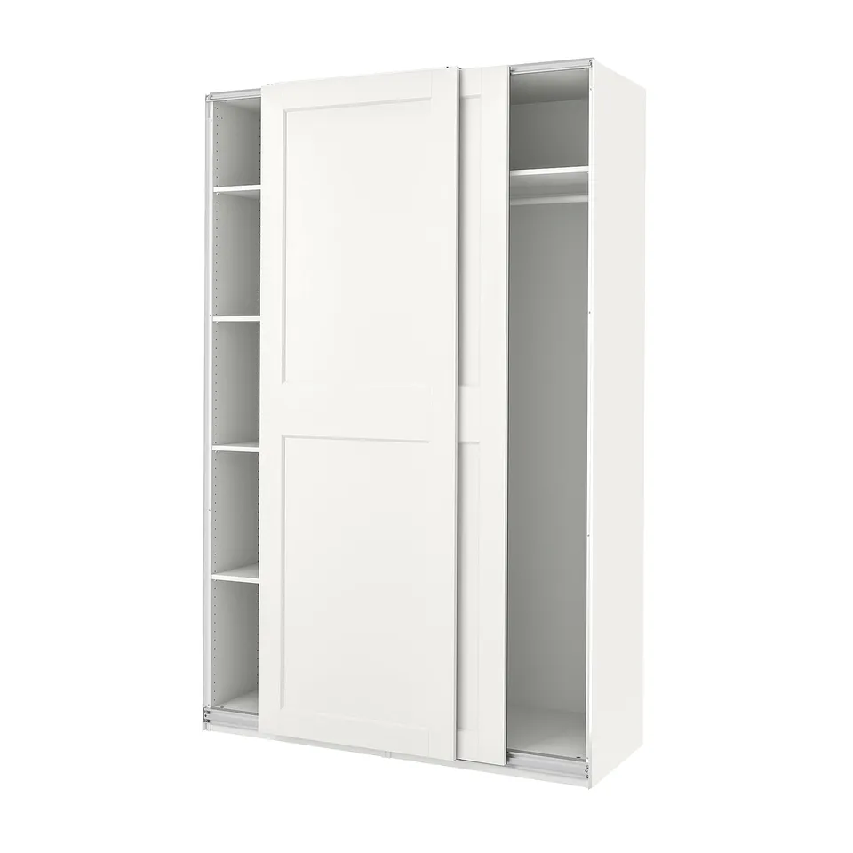 A white PAX wardrobe with sliding doors, minimalist design, and frosted glass inserts.