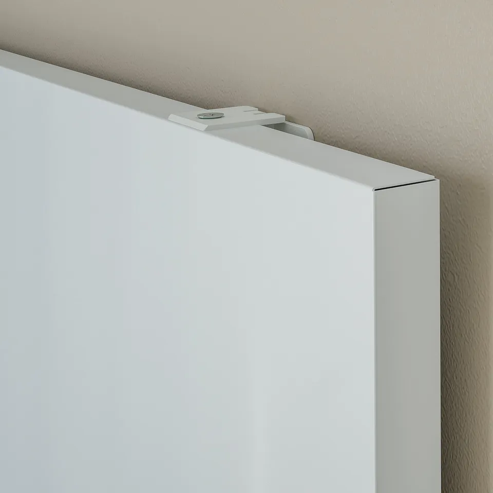 Whiteboard mounted on wall, showing top edge and metal fixing bracket. High-quality, durable design.