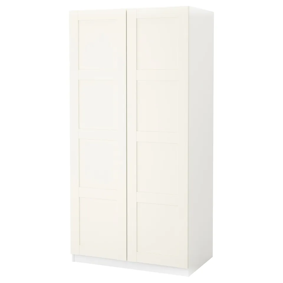 White PAX wardrobe, rectangular shape, sleek design, closed doors.